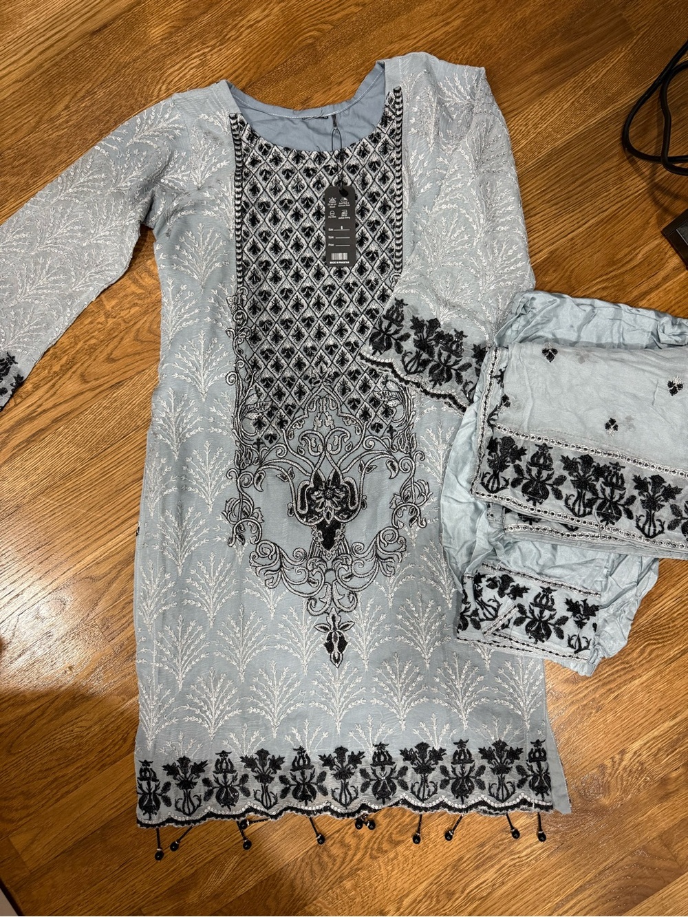 Black and Gray embroidered dress with floral and geometric designs